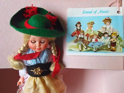 SOUVENIR DOLL from GERMANY with booklet LITTLE WOMEN / SOUND OF MUSIC BOX