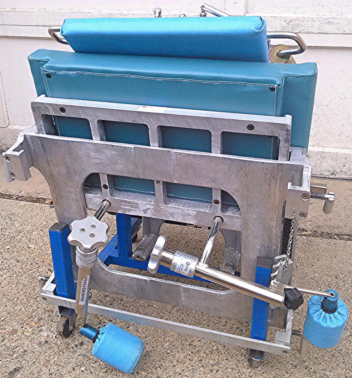 OSI ORTHOPEDIC SYSTEM OSI ANDREWS FRAME OR COCCYX ORTHOPEDIC AMSCO TABLE RACK