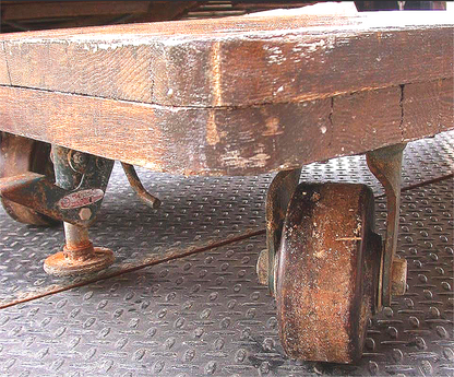 RARE COLSON INDUSTRIAL DESIGN OAK CART COFFEE TABLE 66x32x11 FOUR PHENOLIC WHEEL