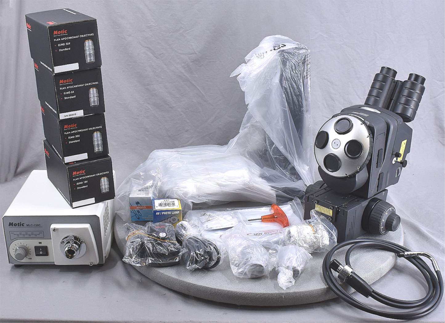 B/NEW MOTIC PSM-1000 TRINOCULAR MLC-150 PLAN APO ELWD 5x10x20x50xOBJE MICROSCOPE