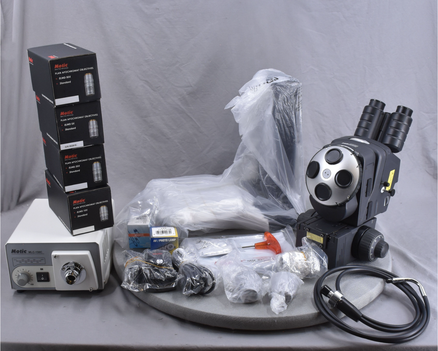 B/NEW MOTIC PSM-1000 TRINOCULAR MLC-150 PLAN APO ELWD 5x10x20x50xOBJE MICROSCOPE